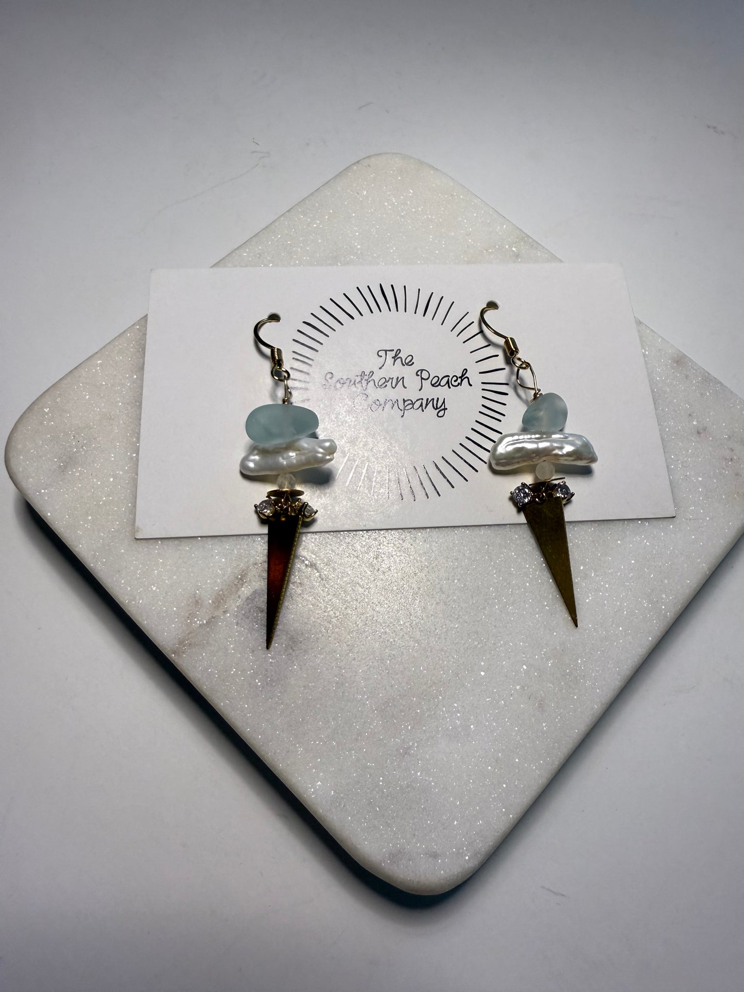 Seaglass triangle ears.
