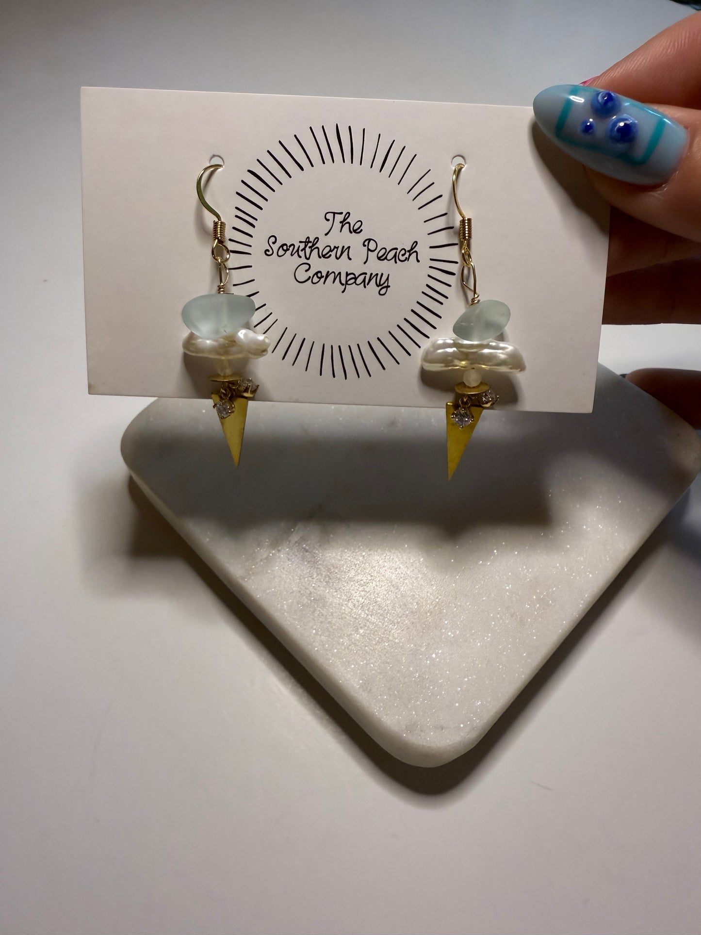 Seaglass triangle ears.
