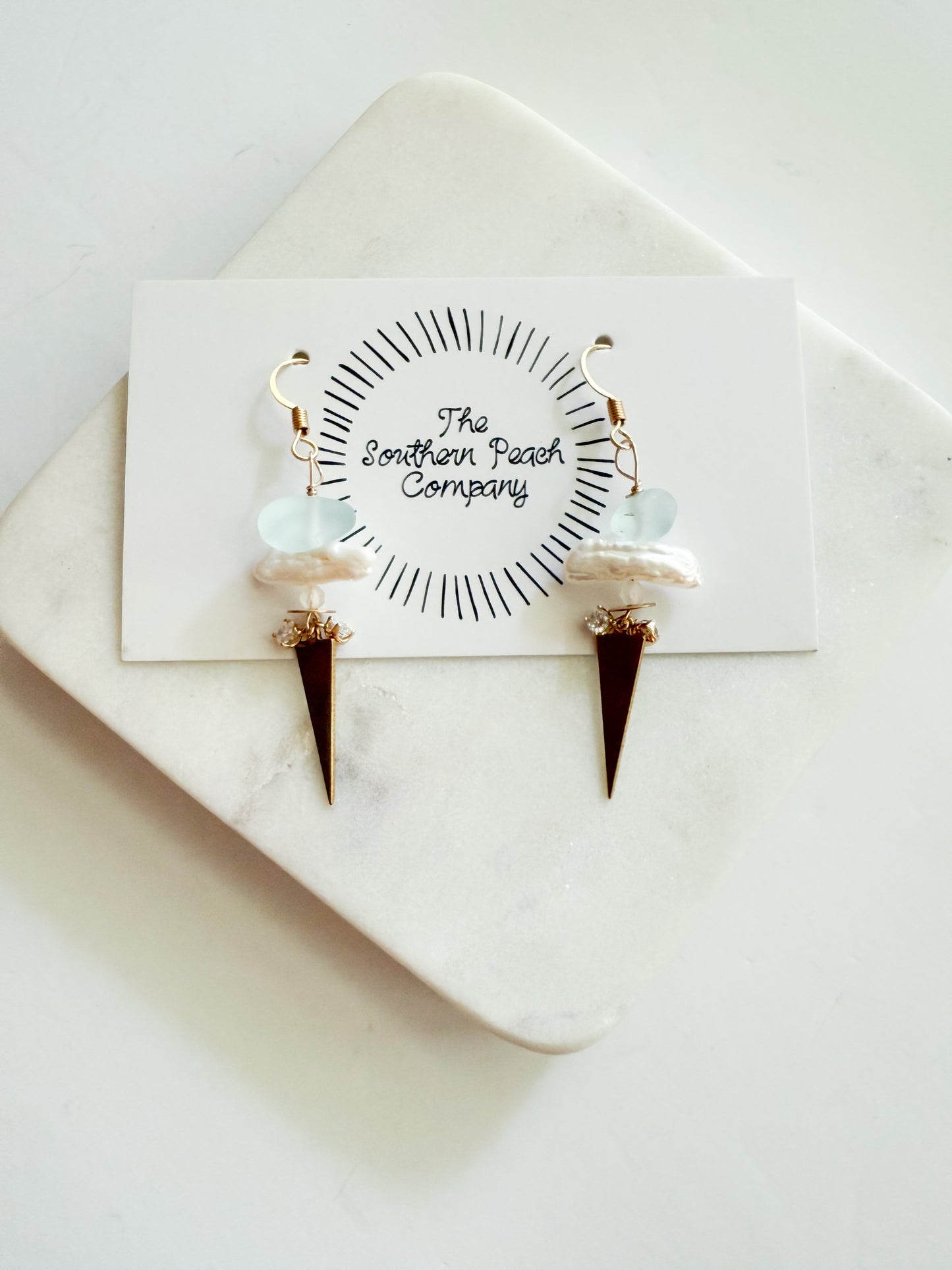 Seaglass triangle ears.