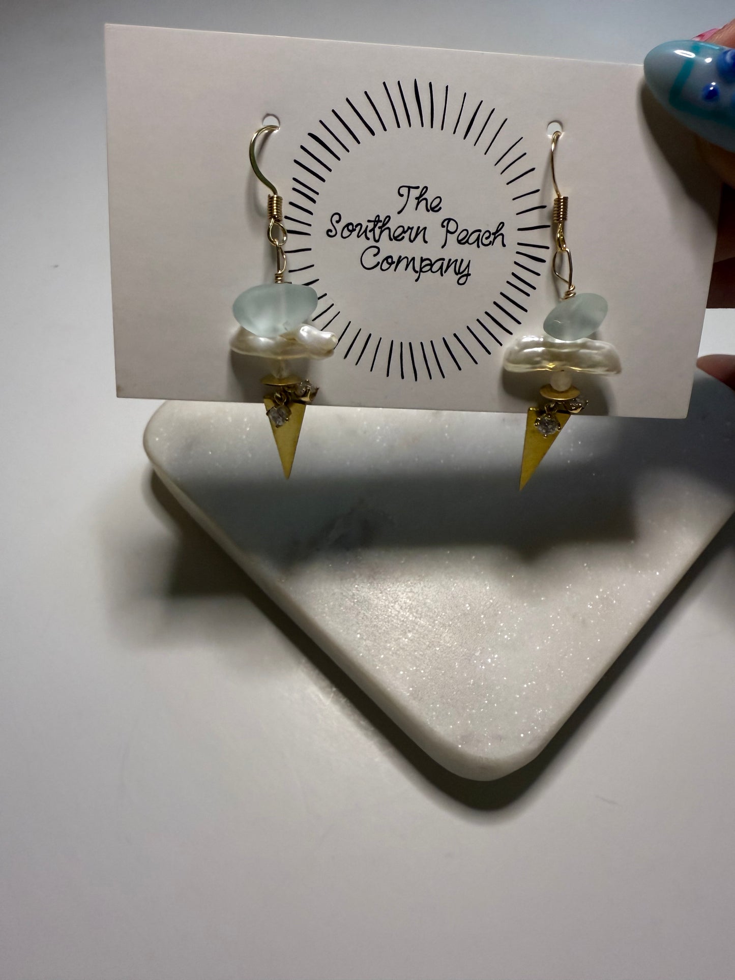 Seaglass triangle ears.